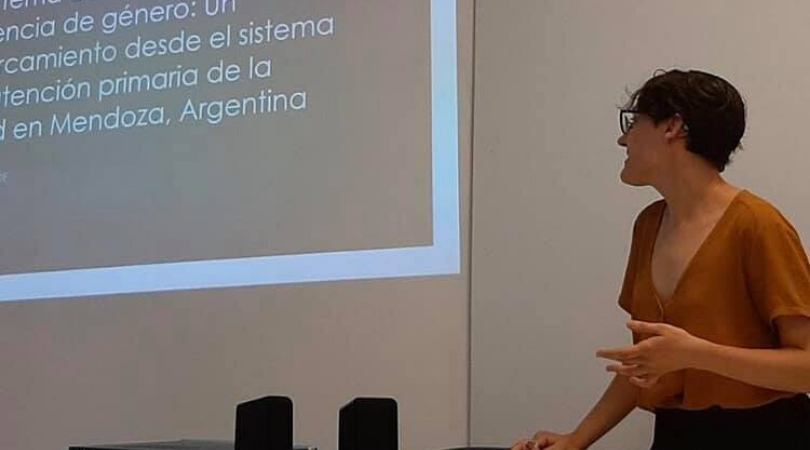 Chiara Pride presenting a research