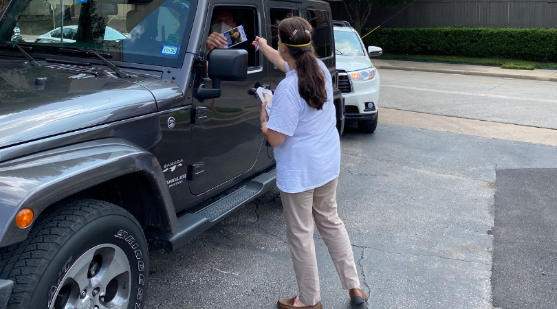 Dr. Carolyn Salter Distributing Flyers