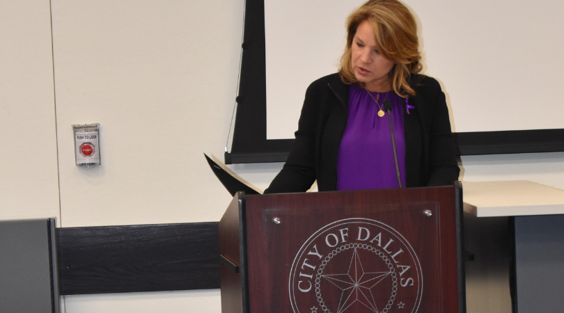 Jennifer Staubach Gates speaking in front of court