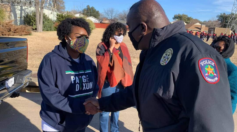 Paige Dixon Handshake with Police