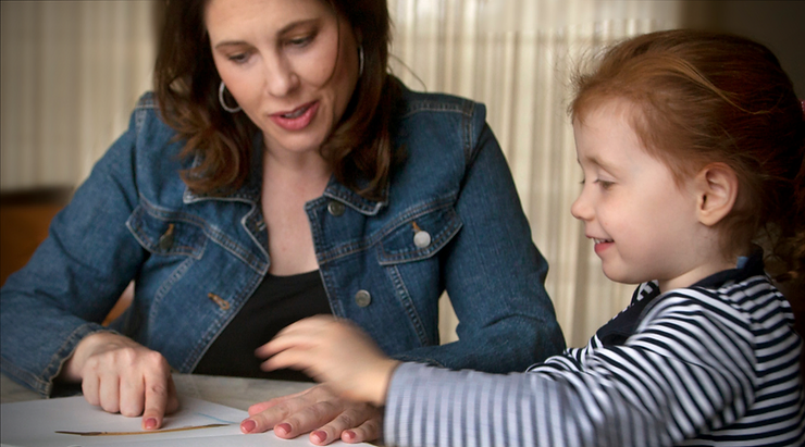 Suzanne Smith teaching a kid